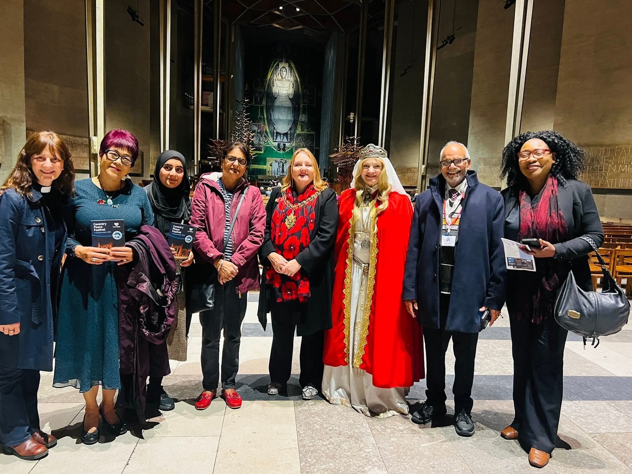 Coventry Diversity Forum group at the Coventry Peace Festival inside Coventry Cathedral